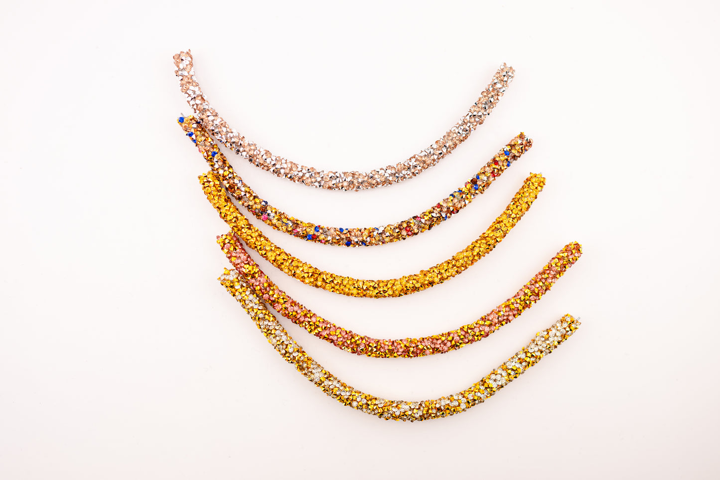 Horse browband Spectrum browband by IBV Equine
Experience a new dimension of browband design. Crafted with a pair of soft,
flexible tubes, each generously sprinkled with dazzling rhinestones, this piece offers a unique texture and radiant sparkle. An internal metal wire allows for effortless shaping, ensuring a perfect contour to your horse's brow and maintaining its elegant form.
Each browband is handmade from scratch using premium European materials and durable leather. Featuring our exclusive magn