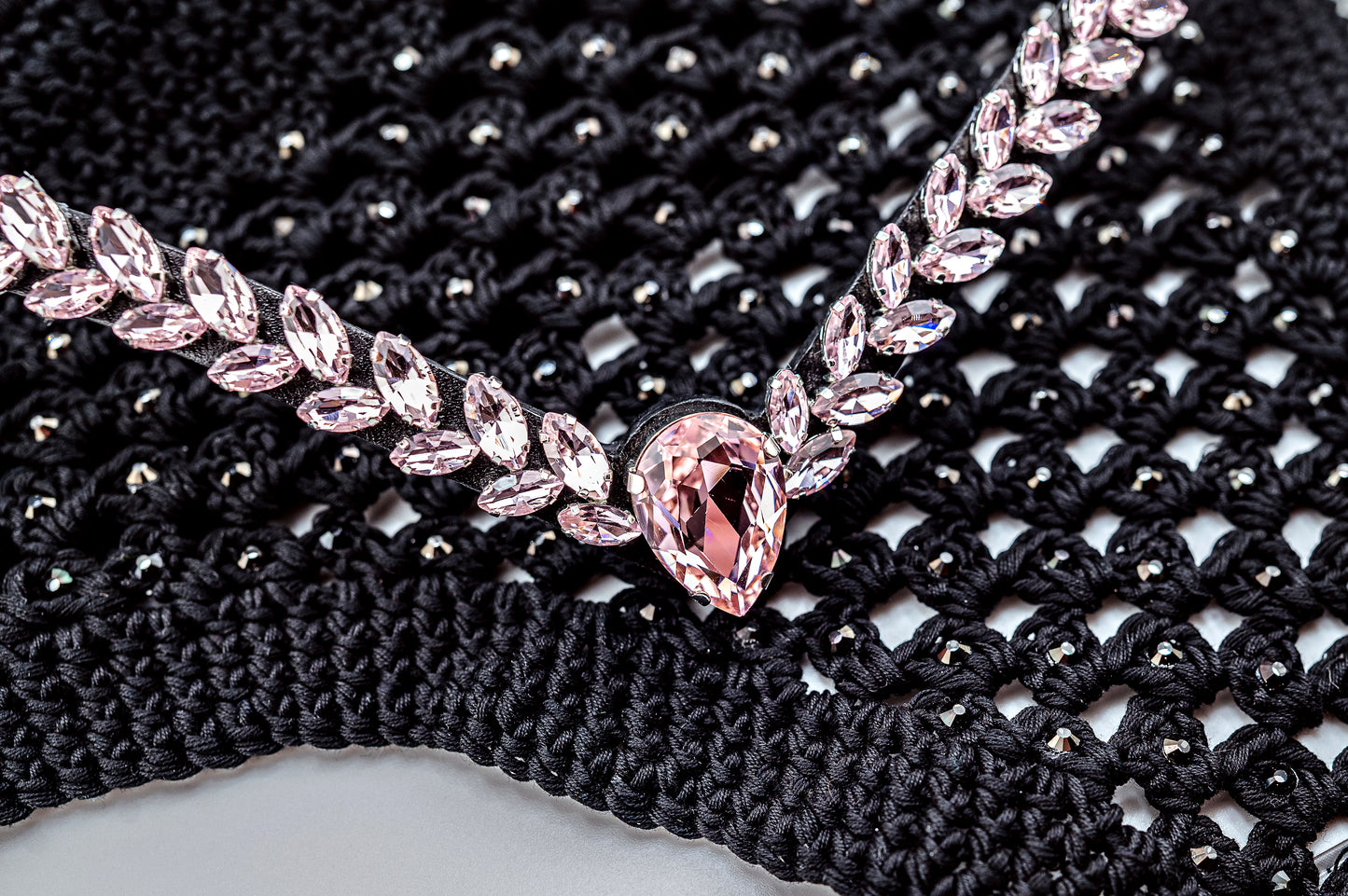 Horse browband Regalia browband by IBV Equine
Experience a new dimension of browband design. Caesar collection browband is a testament to ancient elegance reimagined for modern equestrianism. Its distinctive V-shape features meticulously placed, leaf-like added a large stone in the center for emphasis radiant sparkle.
Each browband is handmade from scratch using premium European materials and durable leather. Featuring our exclusive magnetic snap system,