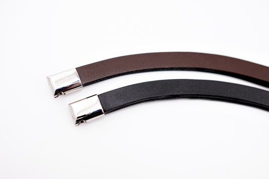 Horse browband Leather by IBV Equine
For those who appreciate refined simplicity, this browband offers a sleek and sophisticated statement, it boasts a subtle yet captivating lustrous finish that gently catches the light, providing a contemporary twist on a timeless design. Its clean, elegant curve enhances your horse's brow with an understated grace, perfect for riders seeking minimalist perfection or a high-quality foundational piece.
Each browband is handmade from scratch using premium European materials
