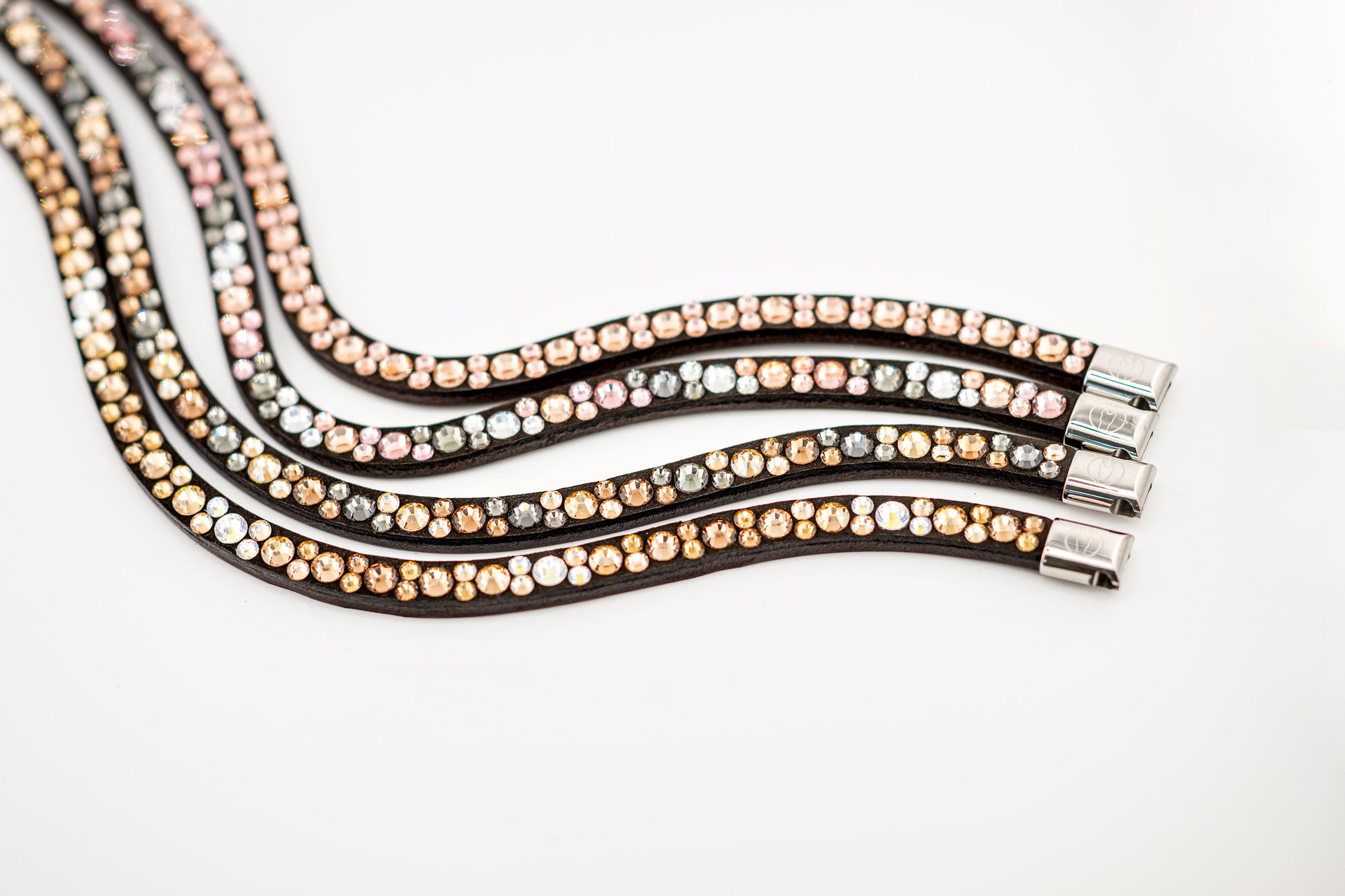 Horse browband Crystal mini  by IBV Equine
Dive into a world of possibilities:
* Combine any colors and sizes from our expansive palette.
* Choose from four distinct rhinestone shapes.
* Explore four unique layout options.
* Select from more than 30 dazzling rhinestone colors.
* Please contact us to create your own design. 

Each rhinestone is meticulously set on a durable nubuck backing, ensuring vibrant sparkle. Our innovative attachment process uses specialized hot glue, creating an incredibly robust bon