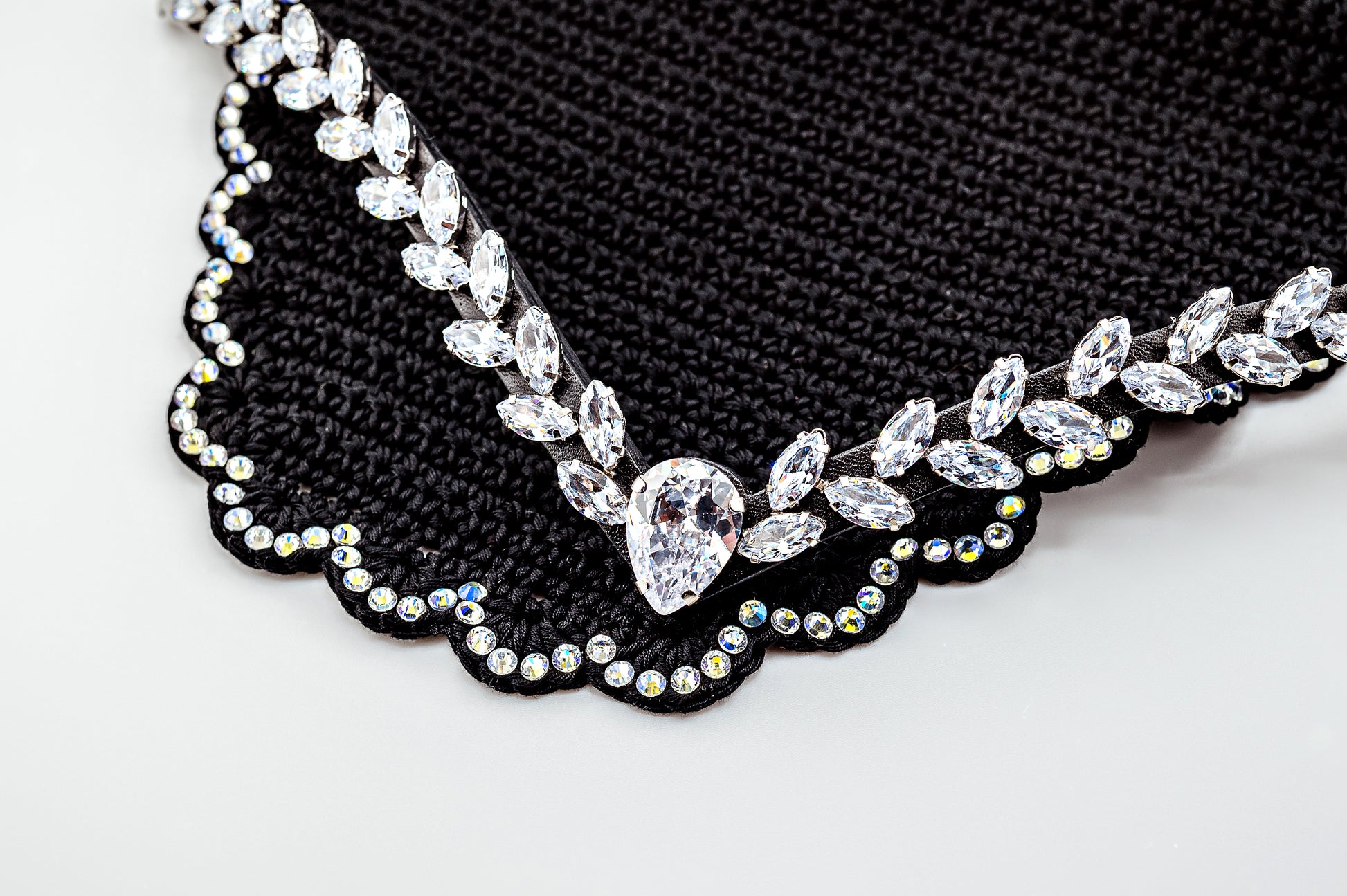 Horse browband Regalia browband  by IBV Equine
Experience a new dimension of browband design. Caesar collection browband is a testament to ancient elegance reimagined for modern equestrianism. Its distinctive V-shape features meticulously placed, leaf-like added a large stone in the center for emphasis radiant sparkle. 
Each browband is handmade from scratch using premium European materials and durable leather. Featuring our exclusive magnetic snap system,